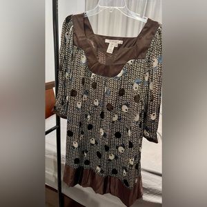 Silk • Flowy • Lightweight • Drapey • Billowed sleeves • Graceful design •